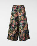 Pantaloni con fiori rosa